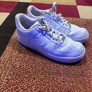 Nike White Low-Top Leather Sneakers with Silver Lace Tag